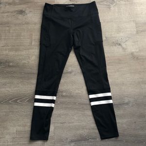 Black leggings with white rugby stripe